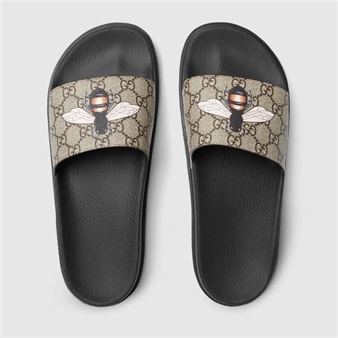 bee print gucci slides